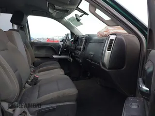 2014 Chevrolet Silverado 1500 LT with VIN 1GCVKREC7EZ312679, listed as a IAAI auction lot 40874395 with 153,234 mi miles and . Bid and sale history available at DreamBid. Image 5.