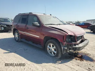 2007 GMC Envoy SLT with VIN 1GKDS13S972171766, listed as a Copart auction lot 76034004 with 182,358 mi miles and Salvage Title. Bid and sale history available at carsss.com. Image 4.