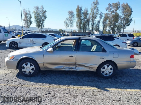 2001 Toyota Camry CE with VIN JT2BG22KX10559757, listed as a IAAI auction lot 41823719 with 72,775 mi miles. Bid and sale history available at carsss.com. Image 14.
