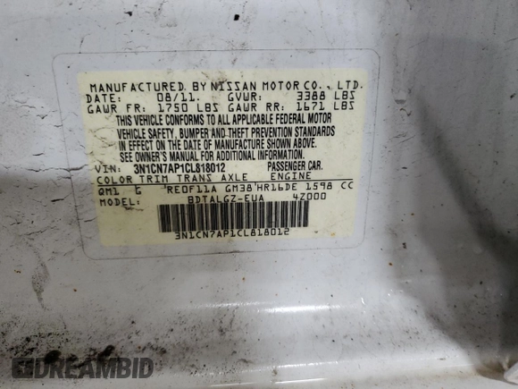 2012 Nissan Versa SV z VIN 3N1CN7AP1CL818012, wystawiony jako Copart lot #52804225 z przebiegiem 194 070 mil mil oraz Szkoda całkowita • Salvage title. Historia ofert i sprzedaży dostępna na DreamBid. Obrazek 13.