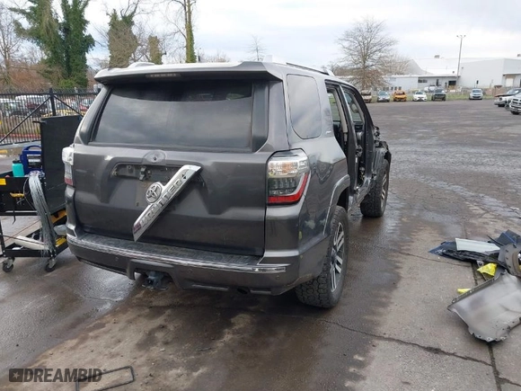 2014 Toyota 4Runner Limited with VIN JTEBU5JR4E5187952, listed as a IAAI auction lot 41261872 with 96,553 mi miles. Bid and sale history available at carsss.com. Image 4.