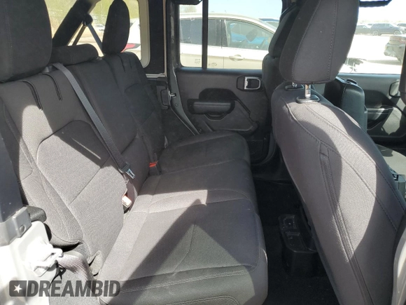 2023 Jeep Wrangler z VIN 1C4JJXN61PW623013, wystawiony jako Copart lot #54681425 z przebiegiem 26 574 mil mil oraz Czysty tytuł • Clean title. Historia ofert i sprzedaży dostępna na DreamBid. Obrazek 11.