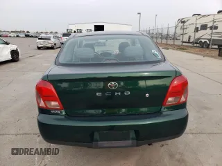 2000 Toyota ECHO with VIN JTDAT1233Y0080978, listed as a Copart auction lot 81164804 with 80,335 mi miles and Salvage Title. Bid and sale history available at DreamBid. Image 6.