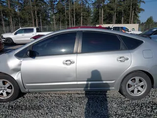 2005 Toyota Prius with VIN JTDKB20U853027020, listed as a IAAI auction lot 42084542 with 147,426 mi miles and . Bid and sale history available at DreamBid. Image 14.