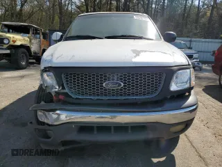 2002 Ford F-150 XLT with VIN 1FTRW07L32KE29159, listed as a Copart auction lot 50596125 with 198,058 mi miles and Salvage Title. Bid and sale history available at carsss.com. Image 5.