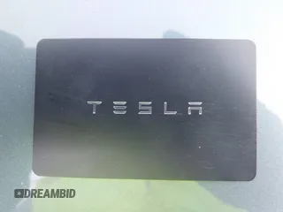 2022 Tesla Model 3 Long Range with VIN 5YJ3E1EB7NF241996, listed as a IAAI auction lot 42115915 with 23,433 mi miles and . Bid and sale history available at DreamBid. Image 11.