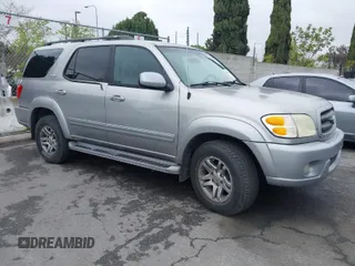 2003 Toyota Sequoia SR5 with VIN 5TDZT34A13S188046, listed as a IAAI auction lot 41909453 with 164,065 mi miles. Bid and sale history available at carsss.com. Image 1.