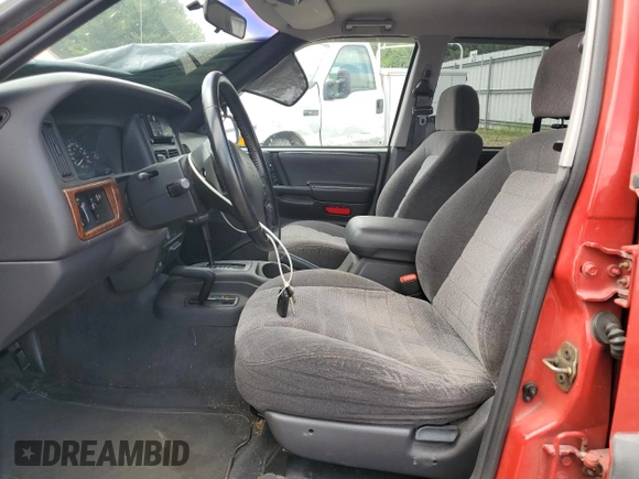 1997 Jeep Grand Cherokee Laredo with VIN 1J4GZ58S8VC601342, listed as a Copart auction lot 65360204 with 139,036 mi miles and Salvage Title. Bid and sale history available at carsss.com. Image 7.