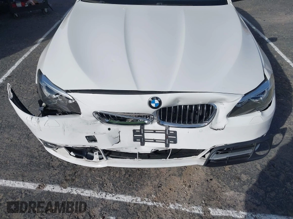 2016 BMW 5 Series 528i z VIN WBA5A5C51GG350114, wystawiony jako IAAI lot #41468375 z przebiegiem 73 968 mil mil oraz . Historia ofert i sprzedaży dostępna na DreamBid. Obrazek 6.
