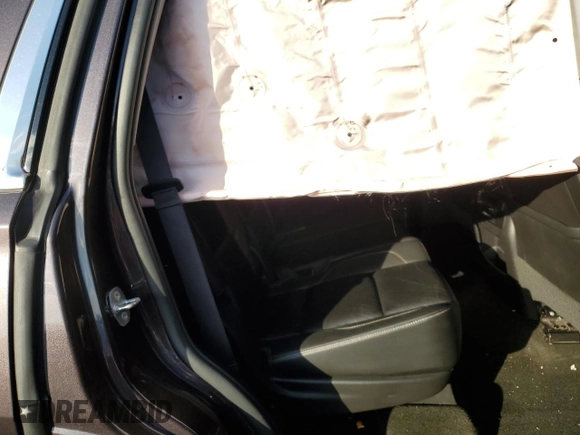 2016 Chevrolet Tahoe LT z VIN 1GNSKBKCXGR365465, wystawiony jako Copart lot #49716705 z przebiegiem Nie podano mil oraz Szkoda całkowita • Salvage title. Historia ofert i sprzedaży dostępna na DreamBid. Obrazek 12.