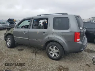 2011 Honda Pilot Touring z VIN 5FNYF4H94BB046303, wystawiony jako Copart lot #58017515 z przebiegiem 118 384 mil mil oraz Szkoda całkowita • Salvage title. Historia ofert i sprzedaży dostępna na DreamBid. Obrazek 2.