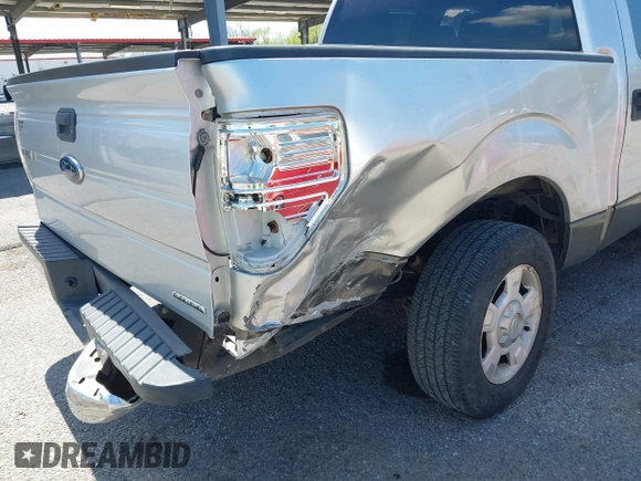 2013 Ford F-150 XL with VIN 1FTEW1CM2DFA62107, listed as a IAAI auction lot 41873021 with 149,648 mi miles and . Bid and sale history available at carsss.com. Image 6.