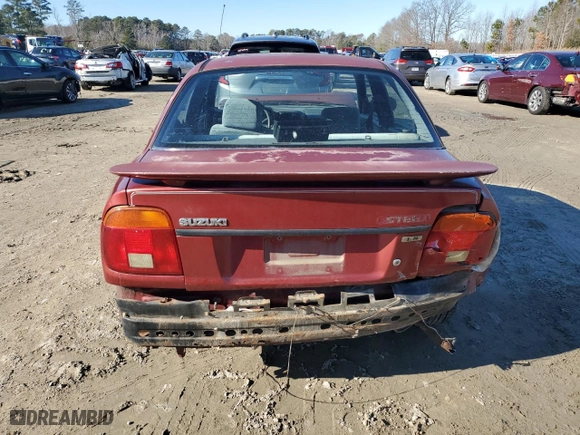 2001 Suzuki Esteem GL with VIN JS2GB41S915202412, listed as a Copart auction lot 88372235 with 301,061 mi miles and Salvage Title. Bid and sale history available at carsss.com. Image 6.