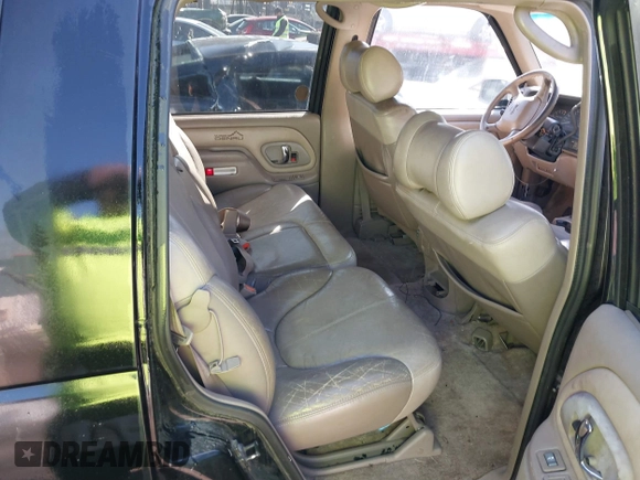 2000 GMC Denali with VIN 1GKEK13R1YR129862, listed as a IAAI auction lot 41833054 with 223,811 mi miles. Bid and sale history available at carsss.com. Image 8.
