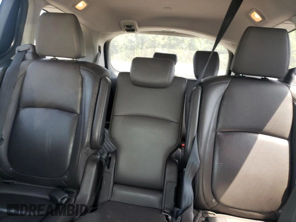 2019 Honda Odyssey Touring z VIN 5FNRL6H87KB098010, wystawiony jako Copart lot #54791505 z przebiegiem 94 477 mil mil oraz Szkoda całkowita • Salvage title. Historia ofert i sprzedaży dostępna na DreamBid. Obrazek 10.