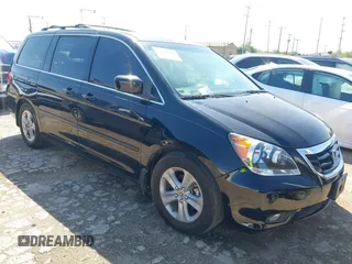 2009 Honda Odyssey Touring с VIN 5FNRL389X9B037638, выставлен на аукционе IAAI как лот 42369901 с пробегом 168 615 миль миль и . История ставок и продаж доступна на DreamBid. Изображение 1.