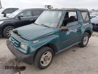 1997 Chevrolet Tracker z VIN 2CNBJ1864V6904934, wystawiony jako IAAI lot #41512446 z przebiegiem 223 032 mil mil oraz . Historia ofert i sprzedaży dostępna na DreamBid. Obrazek 2.