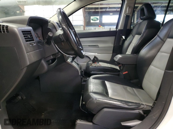 2007 Jeep Compass Limited with VIN 1J8FF57W97D103588, listed as a Copart auction lot 41534315 with 132,296 mi miles and Salvage Title. Bid and sale history available at carsss.com. Image 7.