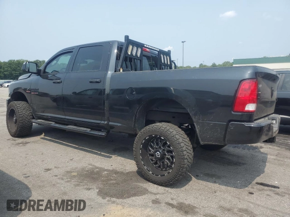 2015 Ram 2500 SLT with VIN 3C6UR5DL9FG693901, listed as a Copart auction lot 67711284 with 104,530 mi miles and Salvage Title. Bid and sale history available at carsss.com. Image 2.