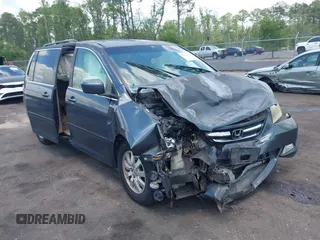 2005 Honda Odyssey Touring z VIN 5FNRL38835B100242, wystawiony jako IAAI lot #42315177 z przebiegiem Nie podano mil oraz . Historia ofert i sprzedaży dostępna na DreamBid. Obrazek 1.