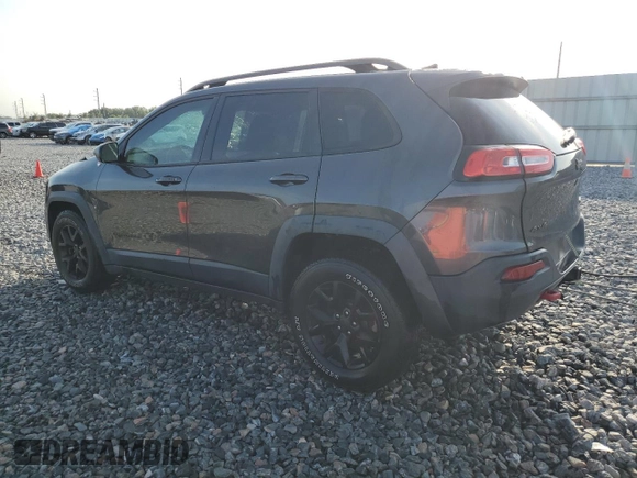 2016 Jeep Cherokee Trailhawk with VIN 1C4PJMBS4GW188840, listed as a Copart auction lot 58760605 with 117,570 mi miles and Salvage title. Bid and sale history available at DreamBid. Image 2.