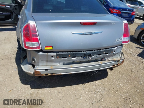 2014 Chrysler 300 with VIN 2C3CCAAG8EH264595, listed as a IAAI auction lot 42076996 with 101,659 mi miles and . Bid and sale history available at DreamBid. Image 6.