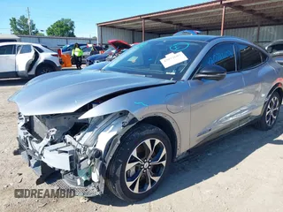 2021 Ford Mustang Mach-E Premium z VIN 3FMTK3SU7MMA02271, wystawiony jako IAAI lot #42072602 z przebiegiem 61 526 mil mil oraz . Historia ofert i sprzedaży dostępna na DreamBid. Obrazek 21.