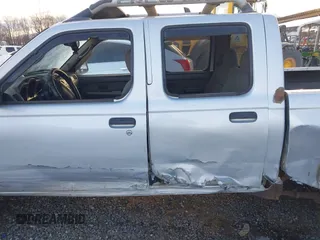 2003 Nissan Frontier SE z VIN 1N6ED29X33C433737, wystawiony jako IAAI lot #41271135 z przebiegiem 289 098 mil mil oraz . Historia ofert i sprzedaży dostępna na DreamBid. Obrazek 14.