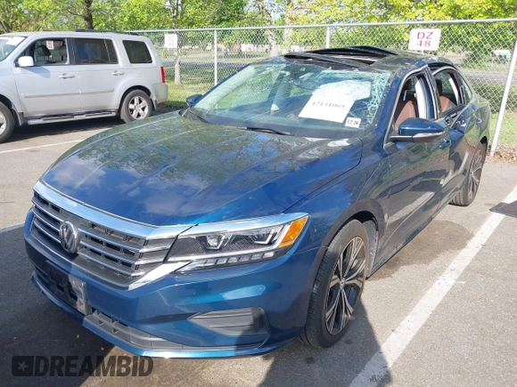 2021 Volkswagen Passat SE with VIN 1VWSA7A36MC010749, listed as a IAAI auction lot 42141065 with 43,571 mi miles and . Bid and sale history available at DreamBid. Image 17.