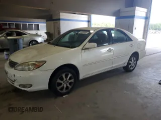 2004 Toyota Camry LE with VIN JTDBE32K940245895, listed as a Copart auction lot 63064585 with 197,467 mi miles and Clean title. Bid and sale history available at DreamBid. Image 1.