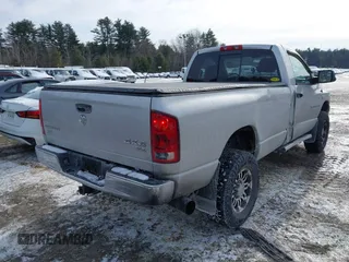 2006 Dodge Ram 2500 SLT with VIN 3D7KS26C46G170596, listed as a IAAI auction lot 41409936 with 153,579 mi miles. Bid and sale history available at carsss.com. Image 4.