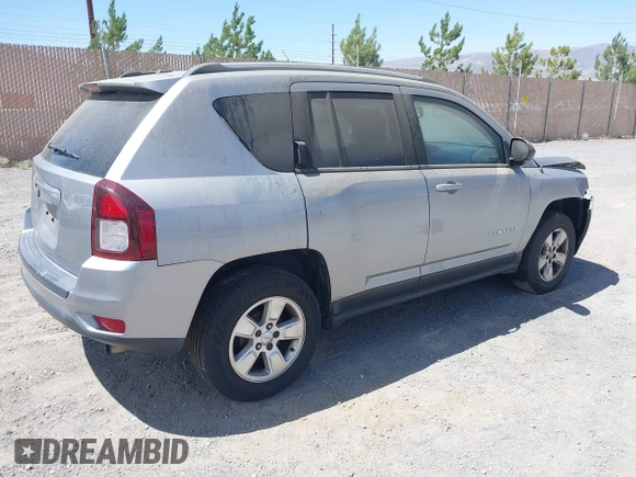 2016 Jeep Compass Sport with VIN 1C4NJCBB2GD577084, listed as a IAAI auction lot 42572348 with 164,234 mi miles and . Bid and sale history available at DreamBid. Image 4.