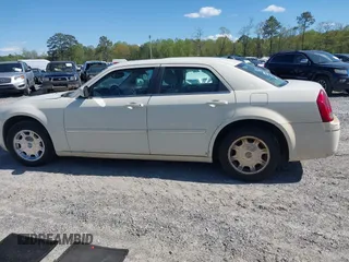 2005 Chrysler 300 Touring with VIN 2C3AA53G45H552972, listed as a IAAI auction lot 41996998 with 297,276 mi miles and . Bid and sale history available at DreamBid. Image 14.