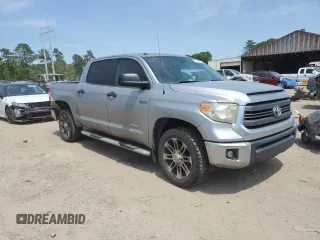 2014 Toyota Tundra SR5 with VIN 5TFEY5F10EX168487, listed as a Copart auction lot 52821885 with 230,634 mi miles and Salvage title. Bid and sale history available at DreamBid. Image 4.