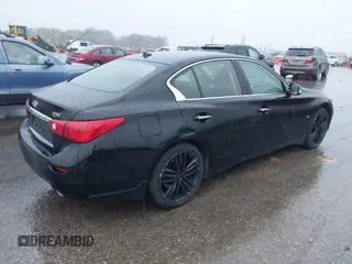 2015 Infiniti Q50 Premium z VIN JN1BV7ARXFM412382, wystawiony jako IAAI lot #40776813 z przebiegiem 66 406 mil mil oraz . Historia ofert i sprzedaży dostępna na DreamBid. Obrazek 4.