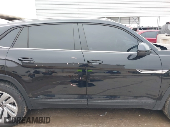 2023 Volkswagen Atlas SE z VIN 1V2KE2CA8PC225834, wystawiony jako IAAI lot #41330975 z przebiegiem 13 629 mil mil oraz . Historia ofert i sprzedaży dostępna na DreamBid. Obrazek 13.
