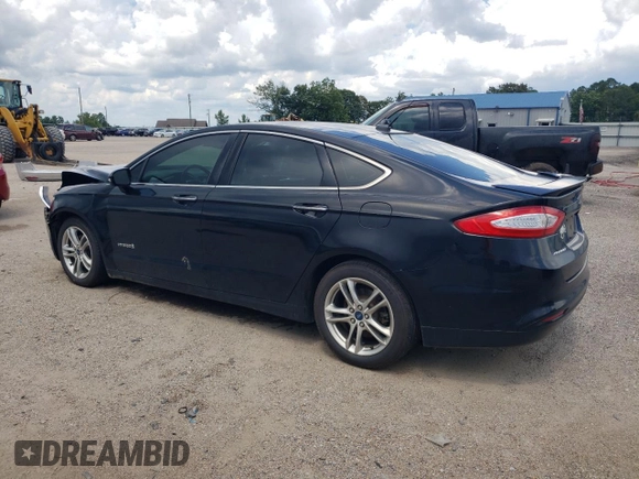 2016 Ford Fusion Titanium Hybrid with VIN 3FA6P0RUXGR204106, listed as a Copart auction lot 62769015 with 106,826 mi miles and Salvage title. Bid and sale history available at DreamBid. Image 2.