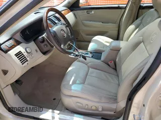 2011 Cadillac DTS Premium Collection z VIN 1G6KH5E62BU144403, wystawiony jako Copart lot #56494305 z przebiegiem 51 950 mil mil oraz Szkody całkowita. Historia ofert i sprzedaży dostępna na DreamBid. Obrazek 7.