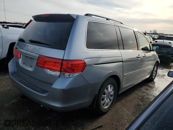2010 Honda Odyssey EX-L with VIN 5FNRL3H69AB001952, listed as a Copart auction lot 49738155 with 95,721 mi miles and Salvage Title. Bid and sale history available at carsss.com. Image 3.