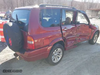 2004 Suzuki XL-7 LX with VIN JS3TX92V844110977, listed as a IAAI auction lot 41343611 with 64,773 mi miles. Bid and sale history available at carsss.com. Image 4.