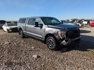 2023 Ford F-150 XL with VIN 1FTFW1E8XPFA49002, listed as a Copart auction lot 41913005 with 20,943 mi miles and Salvage Title. Bid and sale history available at carsss.com. Image 4.
