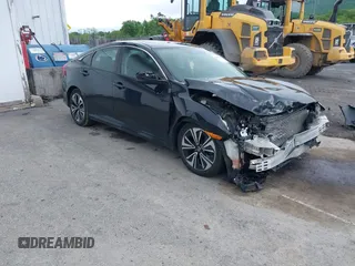 2016 Honda Civic EX-T with VIN 2HGFC1F46GH640027, listed as a IAAI auction lot 42263939 with 153,155 mi miles and . Bid and sale history available at DreamBid. Image 1.