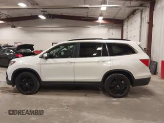 2021 Honda Pilot Special Edition with VIN 5FNYF6H2XMB054312, listed as a IAAI auction lot 41828508 with 115,652 mi miles and . Bid and sale history available at DreamBid. Image 14.