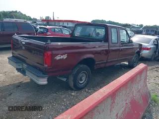 1996 Ford F-150 with VIN 1FTEX14N1TKA29223, listed as a IAAI auction lot 42584324 with 98,379 mi miles and . Bid and sale history available at DreamBid. Image 4.