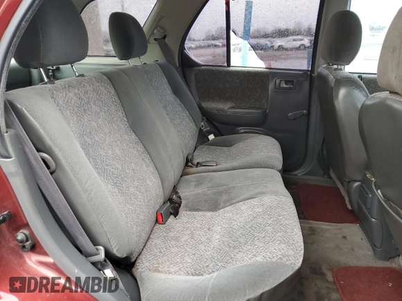 2002 Isuzu Rodeo z VIN 4S2CK58D124323937, wystawiony jako Copart lot #86155194 z przebiegiem 184 491 mil mil oraz Szkoda całkowita • Salvage title. Historia ofert i sprzedaży dostępna na DreamBid. Obrazek 11.