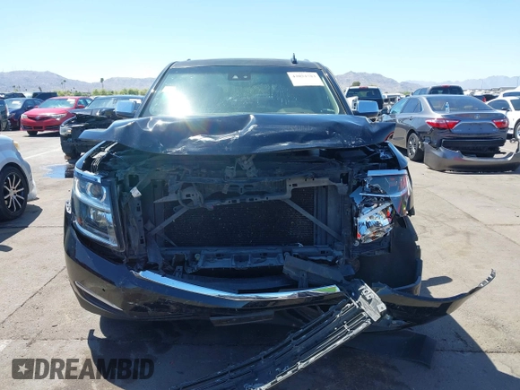 2015 Chevrolet Tahoe LTZ z VIN 1GNSKCKC7FR715512, wystawiony jako IAAI lot #42054583 z przebiegiem 106 941 mil mil oraz . Historia ofert i sprzedaży dostępna na DreamBid. Obrazek 6.