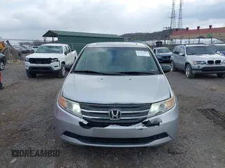 2011 Honda Odyssey EX-L with VIN 5FNRL5H60BB012206, listed as a IAAI auction lot 41982987 with 220,913 mi miles and . Bid and sale history available at carsss.com. Image 12.