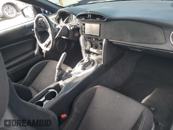 2017 Toyota 86 z VIN JF1ZNAA11H8704619, wystawiony jako Copart lot #50272835 z przebiegiem 104 096 mil mil oraz Szkoda całkowita • Salvage title. Historia ofert i sprzedaży dostępna na DreamBid. Obrazek 8.