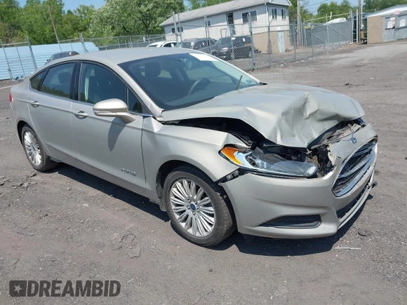 2015 Ford Fusion SE Hybrid z VIN 3FA6P0LU3FR163695, wystawiony jako IAAI lot #42428393 z przebiegiem 237 835 mil mil oraz . Historia ofert i sprzedaży dostępna na DreamBid. Obrazek 1.