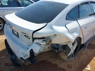 2023 BMW i4 eDrive40 z VIN WBY73AW08PFN72118, wystawiony jako IAAI lot #41849570 z przebiegiem 27 118 mil mil oraz . Historia ofert i sprzedaży dostępna na DreamBid. Obrazek 20.
